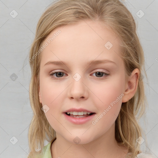 Joyful white child female with medium  brown hair and brown eyes