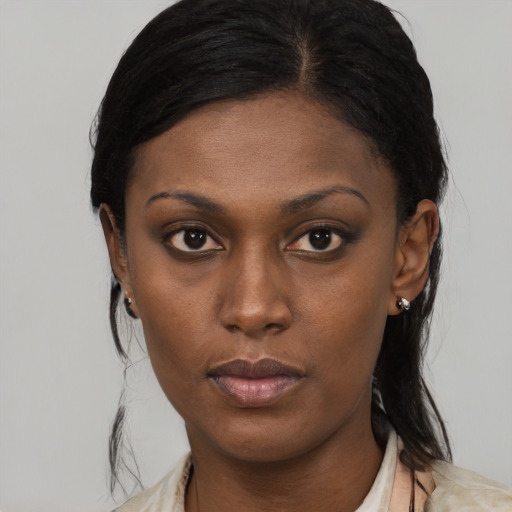 Neutral black young-adult female with medium  black hair and brown eyes