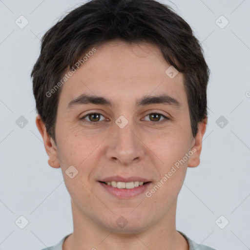 Joyful white young-adult male with short  brown hair and brown eyes