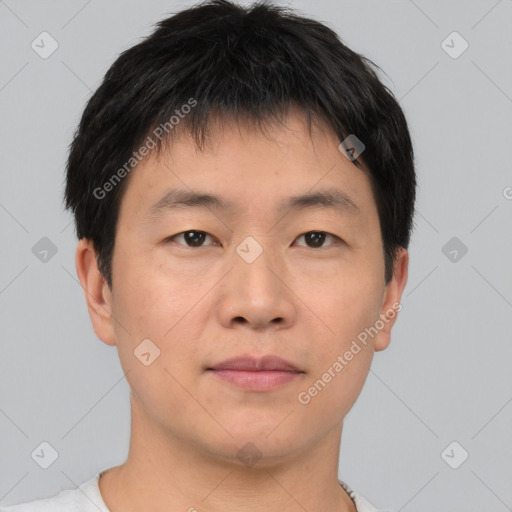 Neutral asian young-adult male with short  brown hair and brown eyes