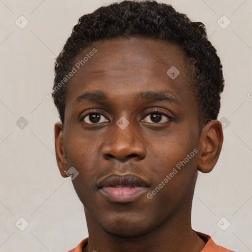 Neutral black young-adult male with short  brown hair and brown eyes