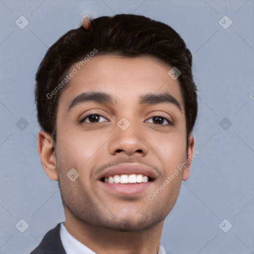 Joyful white young-adult male with short  black hair and brown eyes