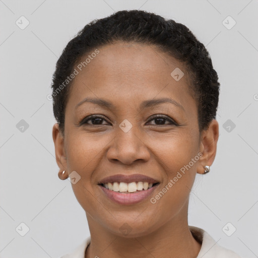 Joyful latino young-adult female with short  brown hair and brown eyes