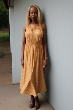 Ethiopian 45 years female with  blonde hair