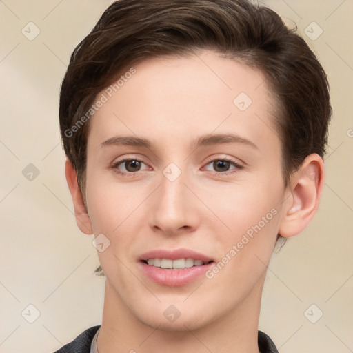 Joyful white young-adult female with short  brown hair and grey eyes