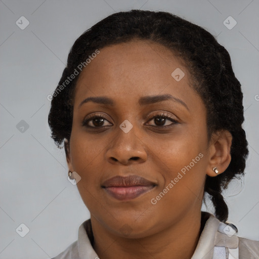 Joyful black young-adult female with medium  black hair and brown eyes