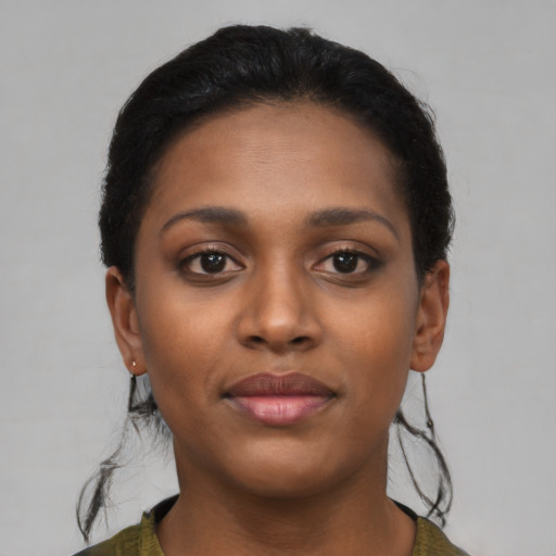 Neutral black young-adult female with short  black hair and brown eyes