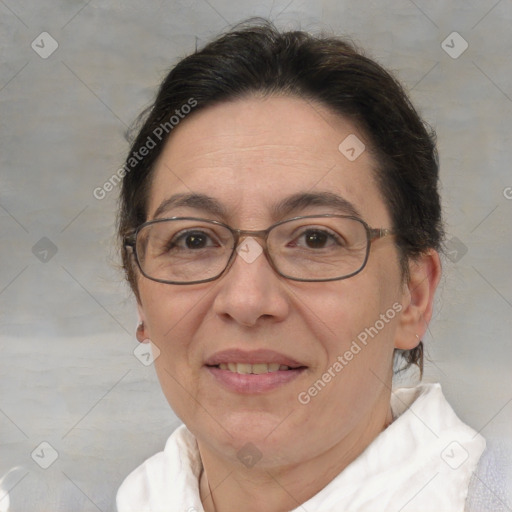 Joyful white adult female with short  brown hair and brown eyes