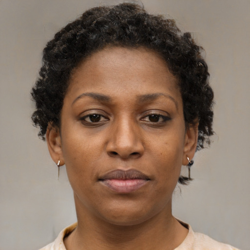 Neutral black young-adult female with short  brown hair and brown eyes