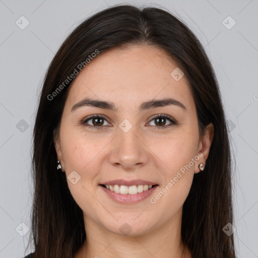 Joyful white young-adult female with long  brown hair and brown eyes