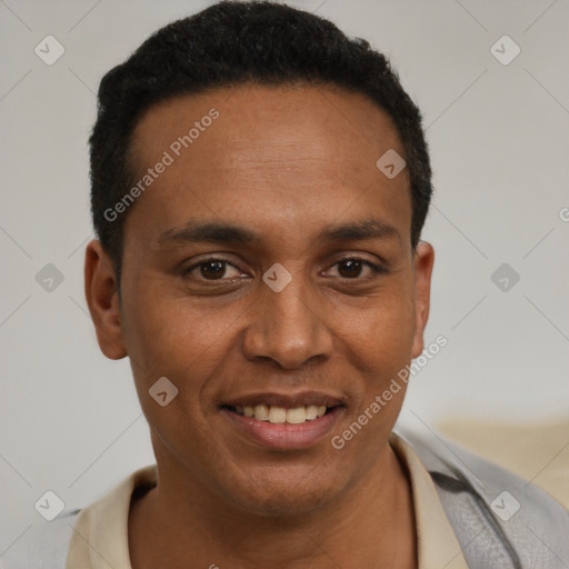 Joyful latino young-adult male with short  black hair and brown eyes