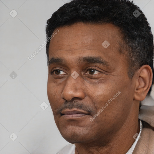 Neutral black adult male with short  black hair and brown eyes
