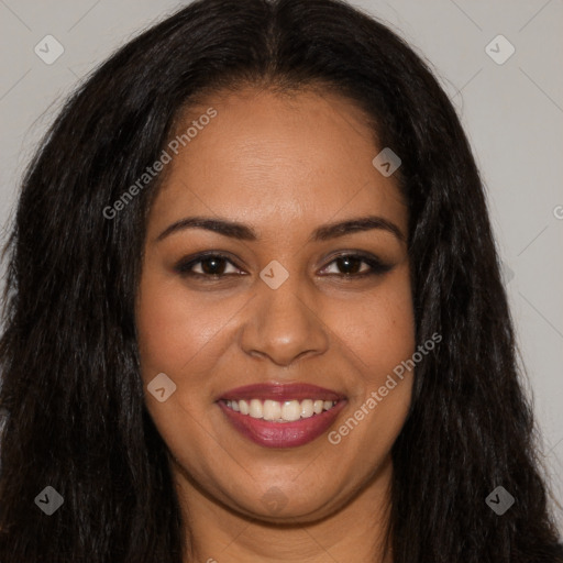 Joyful black young-adult female with long  brown hair and brown eyes