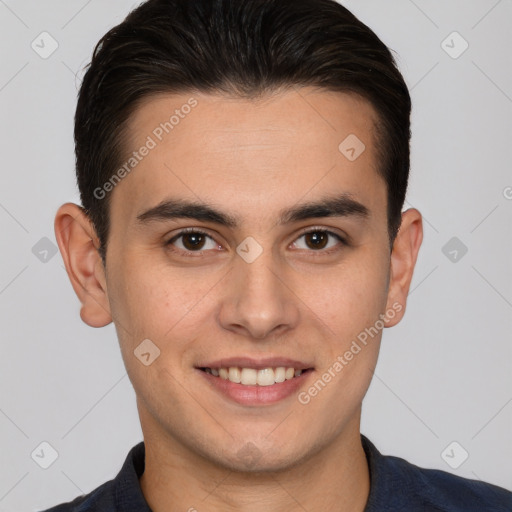 Joyful white young-adult male with short  brown hair and brown eyes