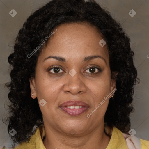 Joyful latino adult female with medium  brown hair and brown eyes