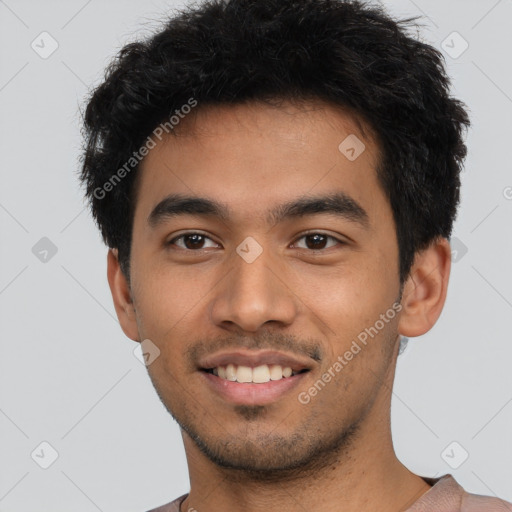 Joyful latino young-adult male with short  black hair and brown eyes