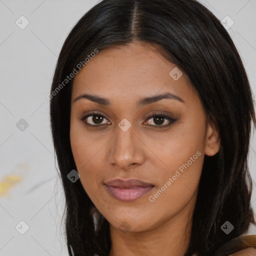 Joyful latino young-adult female with medium  brown hair and brown eyes