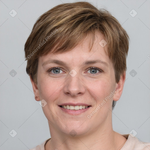 Joyful white young-adult female with short  brown hair and grey eyes