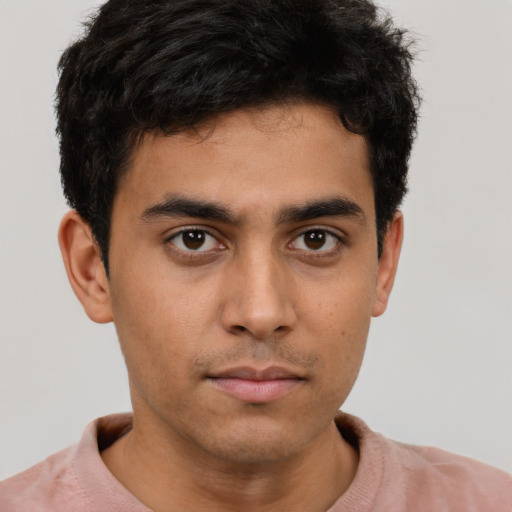 Neutral latino young-adult male with short  brown hair and brown eyes
