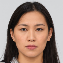 Neutral asian young-adult female with long  brown hair and brown eyes