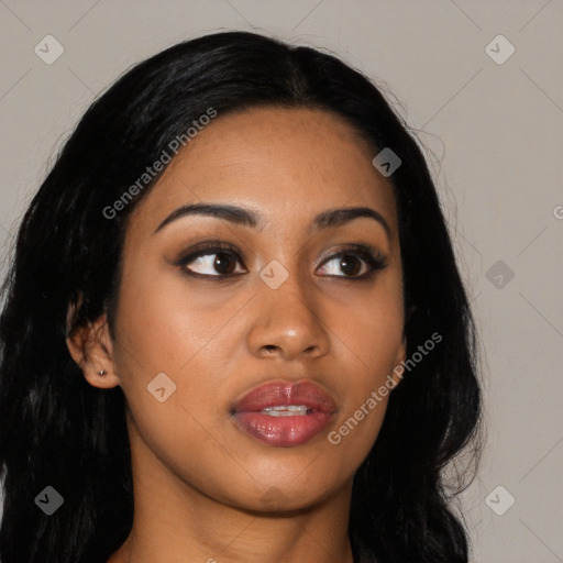 Joyful asian young-adult female with long  black hair and brown eyes