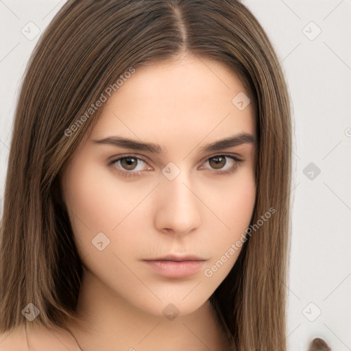 Neutral white young-adult female with long  brown hair and brown eyes