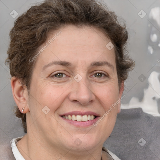 Joyful white adult female with short  brown hair and brown eyes