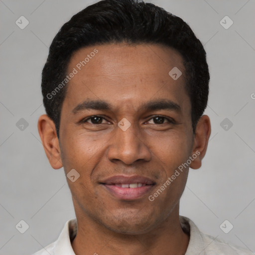 Joyful latino young-adult male with short  black hair and brown eyes