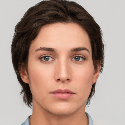 Neutral white young-adult female with short  brown hair and brown eyes