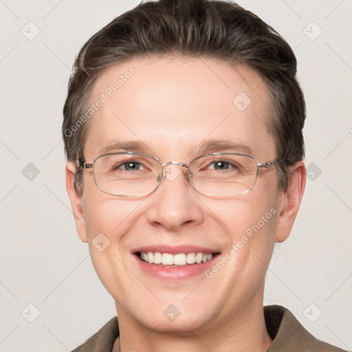 Joyful white adult male with short  brown hair and grey eyes