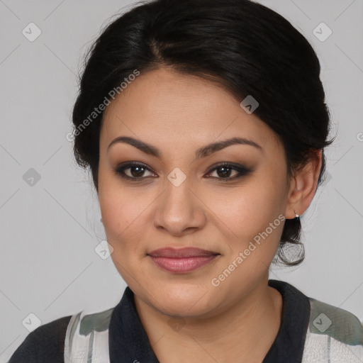 Joyful latino young-adult female with medium  brown hair and brown eyes