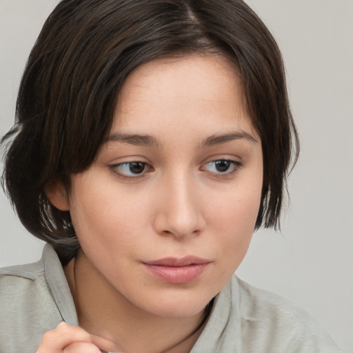 Neutral white young-adult female with medium  brown hair and brown eyes