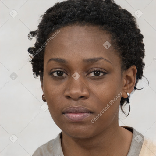 Neutral black young-adult female with short  brown hair and brown eyes