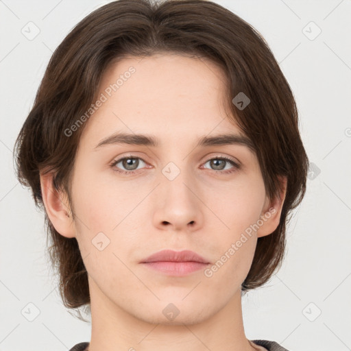 Neutral white young-adult female with medium  brown hair and brown eyes