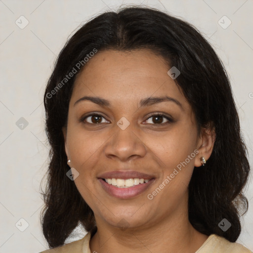 Joyful latino adult female with medium  brown hair and brown eyes