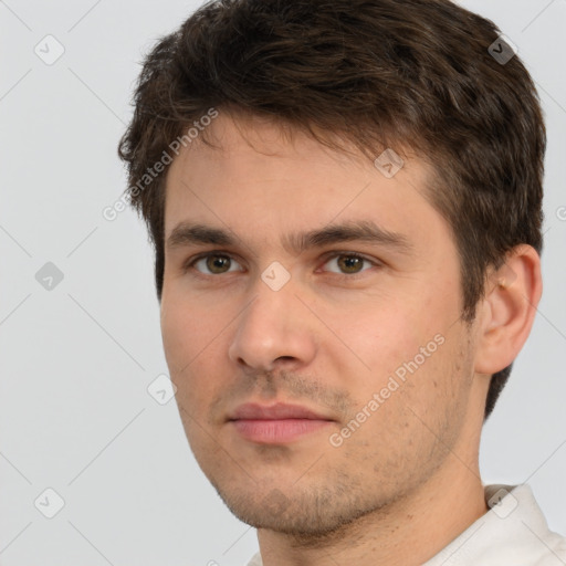 Neutral white young-adult male with short  brown hair and brown eyes