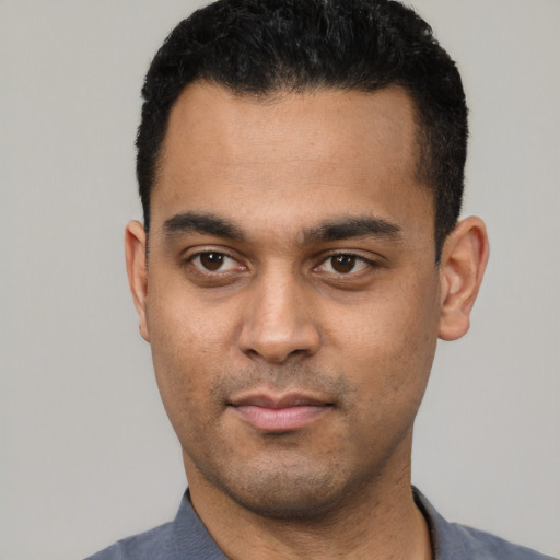 Neutral latino young-adult male with short  black hair and brown eyes