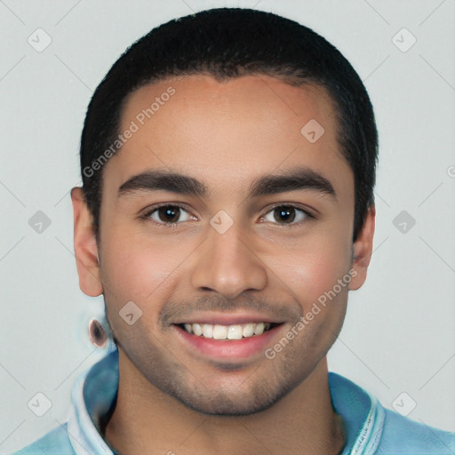 Joyful white young-adult male with short  black hair and brown eyes