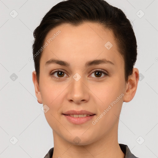 Joyful white young-adult female with short  brown hair and brown eyes