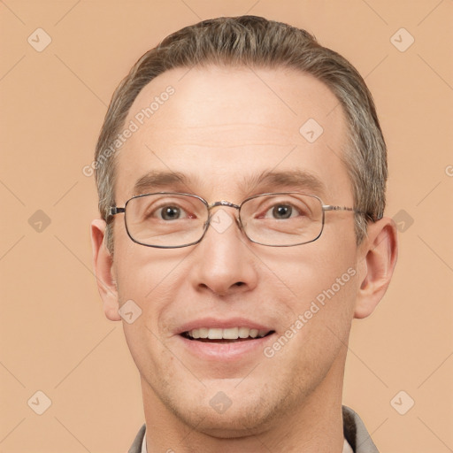 Joyful white adult male with short  brown hair and brown eyes