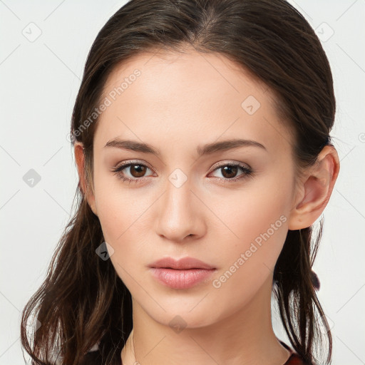 Neutral white young-adult female with long  brown hair and brown eyes