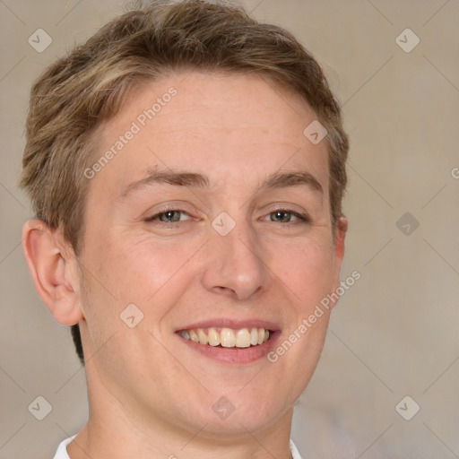 Joyful white adult female with short  brown hair and grey eyes