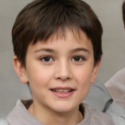 Joyful white child female with short  brown hair and brown eyes