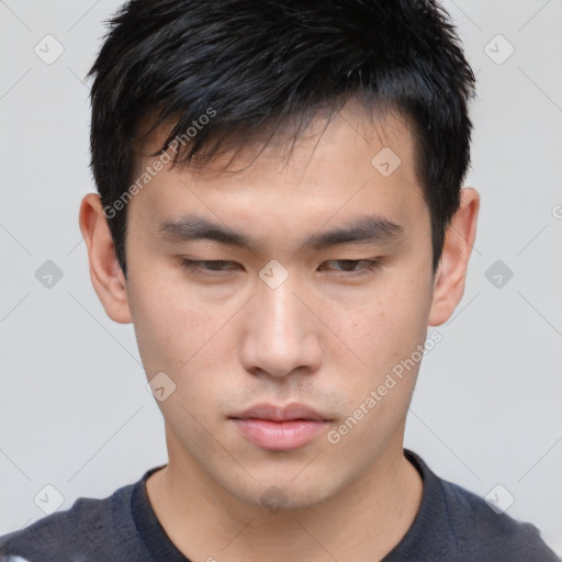 Neutral asian young-adult male with short  brown hair and brown eyes