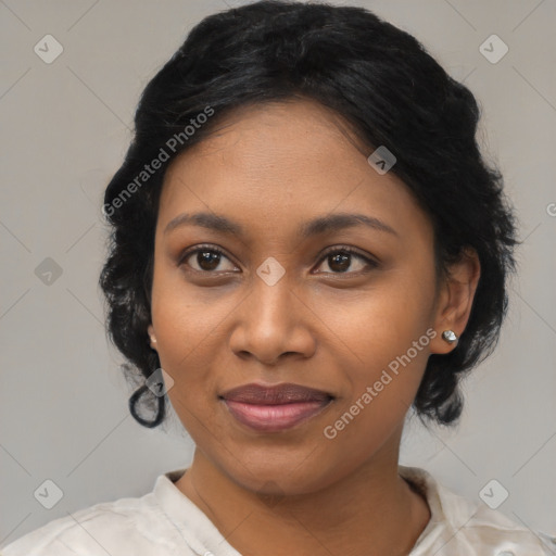 Joyful black young-adult female with medium  black hair and brown eyes