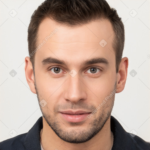 Neutral white young-adult male with short  brown hair and brown eyes