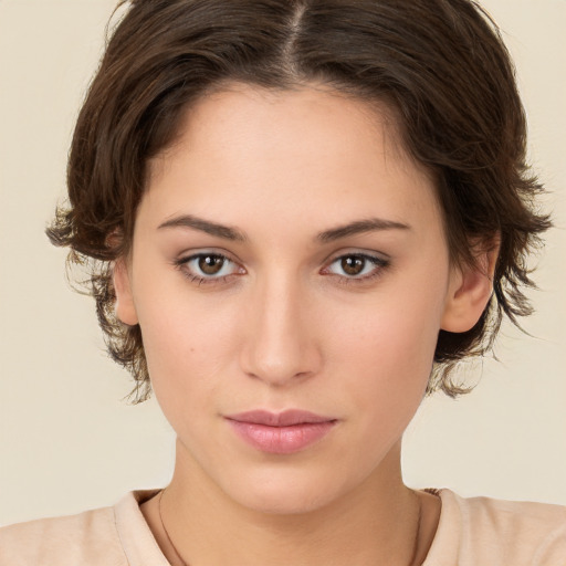 Neutral white young-adult female with medium  brown hair and brown eyes