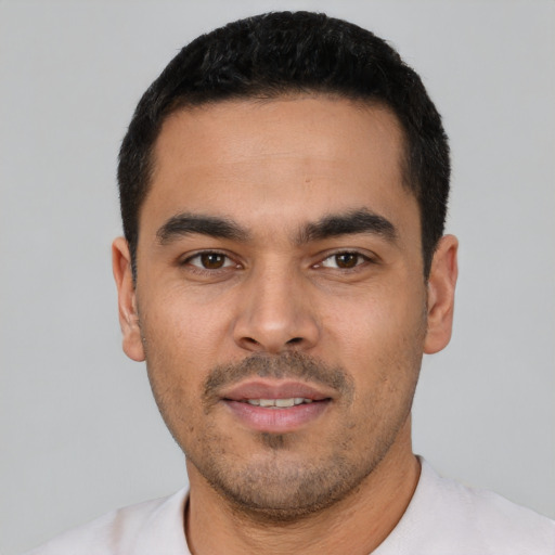 Neutral latino young-adult male with short  black hair and brown eyes