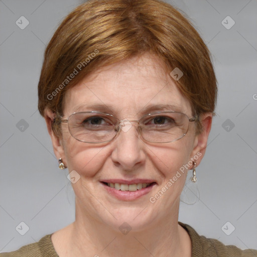 Joyful white adult female with medium  brown hair and blue eyes