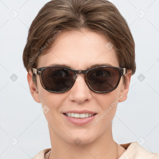 Joyful white young-adult female with medium  brown hair and blue eyes